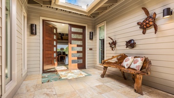 Gorgeous entryway featuring oversize front door.