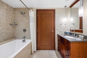 The second guest full bathroom with a shower/tub combo.