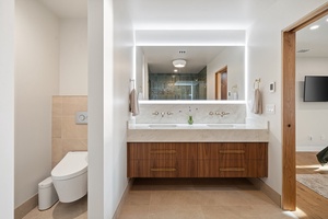 The ensuite bath with dual vanities.