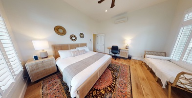 Second bedroom with queen-sized bed.