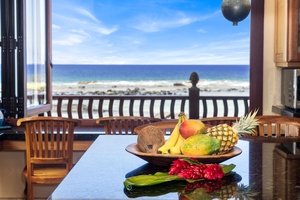 Start your day with fresh fruit and waves—oceanfront breakfast settings don’t get better than this.