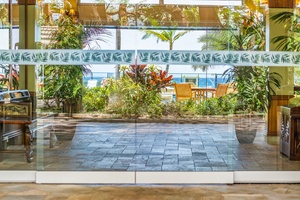 Lush tropical grounds surround Mahana 1118, offering a peaceful retreat.