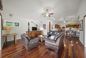 Second angle of the living space showing indoor-outdoor flow and abundant natural light.