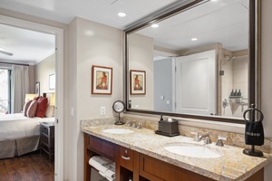 Dual granite vanities at Honua Kai Konea 204 offer the perfect setup for couples to refresh in style.