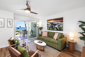 Gather in the living room with ocean views, stylish decor, and the comfort of brand-new furnishings.