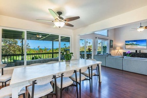 Dining table with seating for 10 makes this home the perfect spot for large families or friends to come together