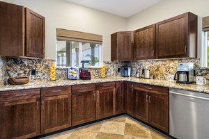Plenty of counter space and custom cabinets keep everything organized for long-term stays.