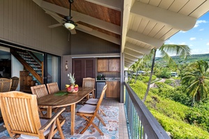 Relax and dine outdoors with breezy palm-lined views from your lanai.