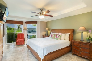 The primary suite has a king bed and access to a private lanai.