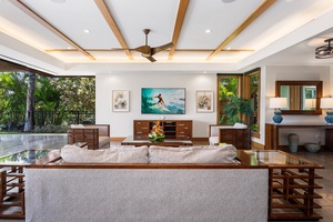 Comfortable seating and curated island decor create a tranquil gathering space.