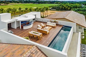 Relax on the rooftop deck, featuring a private pool and comfortable seating areas.
