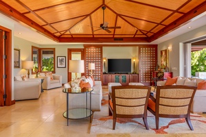 Curl up in the cozy living room with smart TV and comfortable seating for all.