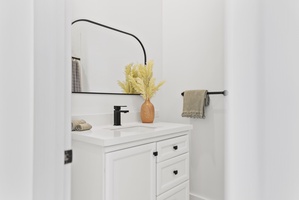 The chic vanity with a single sink offers a stylish and functional space.