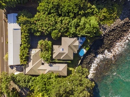 Aerial view of the home and neighboring property