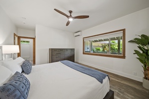 Bright, airy sleeping quarters with A/C and tasteful furnishings—ideal for restful island nights.