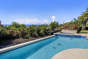 Inviting pool setting with plenty of space for lounging and soaking up the sun.