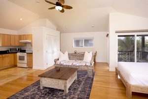 The guest suite features a mini kitchen with ample appliances to prep delightful meals.