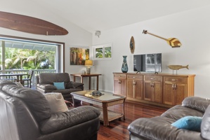 Cozy entertainment space perfect for unwinding after a day exploring Haleiwa.