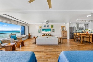 Open floor plan with coastal-chic design, inviting guests to unwind in a bright, breezy environment steps from the beach.