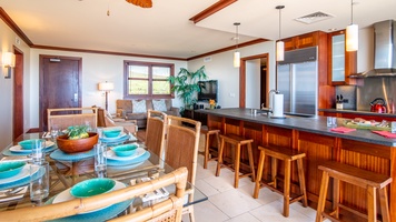 Another view of the kitchen, dining and living area.