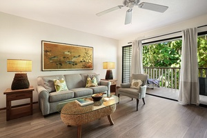 Living room with pull-out couch and direct access to the private lanai.