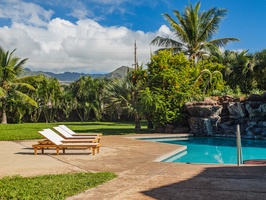 Poolside loungers for sunbathing.*