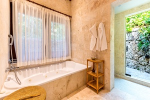 Soak up and relax in the tub of the spa like ensuite bathroom.