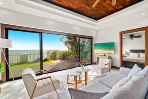 Cozy seating area in the living room with seamless outdoor access.