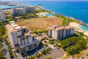 Beautiful beachfront resort community with pristine beaches, crystal-clear waters, and lush tropical landscaping creating the perfect Hawaiian getaway destination.