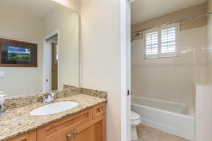 Guest bathroom with tub