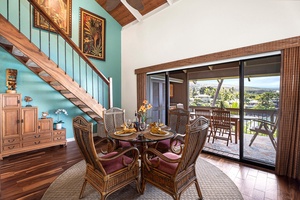 Gather for meals with a view—indoor dining area opens directly to the oceanfront lanai.