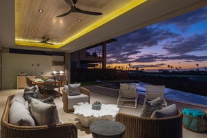 Experience the epitome of outdoor relaxation in this luxuriously appointed lounge area.