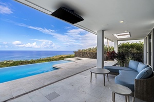 Unwind on your private terrace where infinity pool meets endless ocean views, creating your perfect tropical escape.