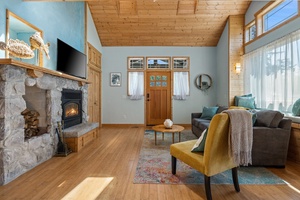 Inviting and expansive living space featuring beautiful wooden flooring