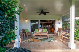 Sip cocktails at sunset from the covered lanai, where evenings unfold with glowing skies and tranquil golf course views.