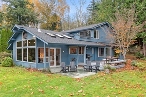 Step outside to landscaped grounds and cozy outdoor seating—designed for connection, comfort, and coastal charm.