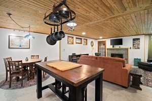 The breakfast bar adds extra seating and function—perfect for casual bites or morning coffee rituals.