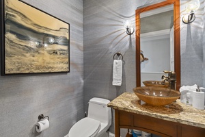The powder room at Wailea Luxury Residence Hoolei 23-3 is a stylish and serene island retreat.