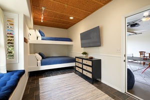 Your kids will love this cozy bunk room with built-in beds, flat-screen TV, and plenty of storage for all their vacation treasures.