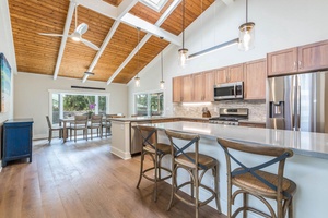 Enjoy seamless flow from Lani Oasis’ chef-ready kitchen to the dining area, making group meals effortless and inviting.