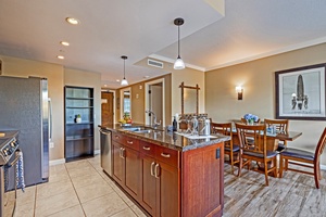 The kitchen, equipped with top-of-the-line Bosch-made stainless steel appliances is a chef's dream.