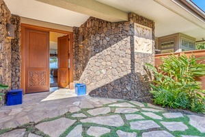 Arrive in style with a warm Aloha at the stone-accented front entrance.