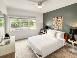 Relax in the guest cottage suite, featuring a cozy queen bed and private entrance.