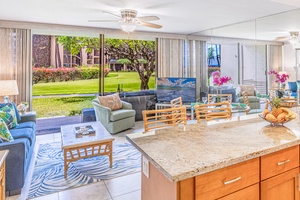 Whip up island meals in Papakea K-105’s sun-filled kitchen with relaxing garden views.