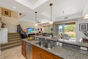 Granite countertops with a scenic view backdrop.