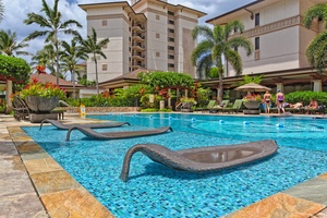 The enchanting lap pool with water loungers.