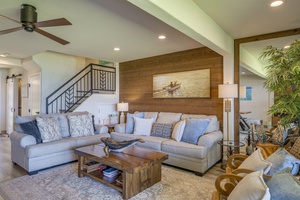 Spacious and cozy living room with plush seating, ideal for relaxing with loved ones.