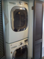 High-efficiency stacked washer/dryer unit keeps beachwear fresh during extended stays.