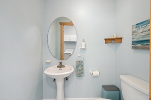 Step into elegance with this minimalist powder room