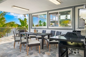 Dine al fresco with seating for the whole group, surrounded by tropical breezes and marina views.